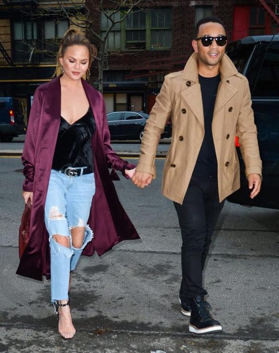 Chrissy Teigen wears Victoria Hayes Burgundy Duster Coat and pants