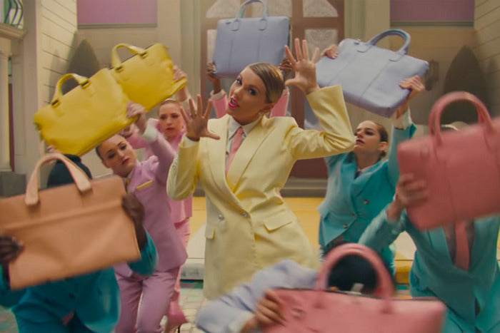 Taylor Swift wears Victoria Hayes SS19 yellow cotton twill suit in her music video for her latest single, “Me!”
