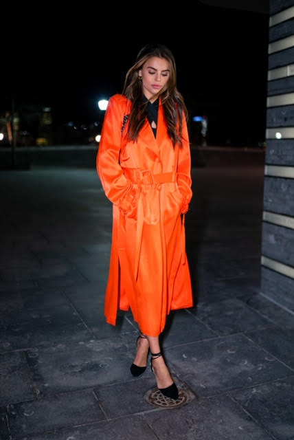 Model Brooks Nader wears Victoria Hayes silk trench