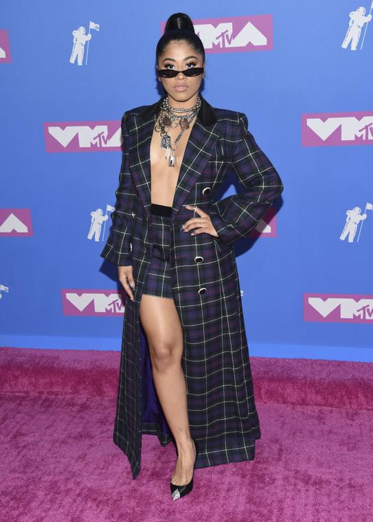 Hennessy Carolina wears the Heather Tailored Coat and mini skirt to the Video Music Awards