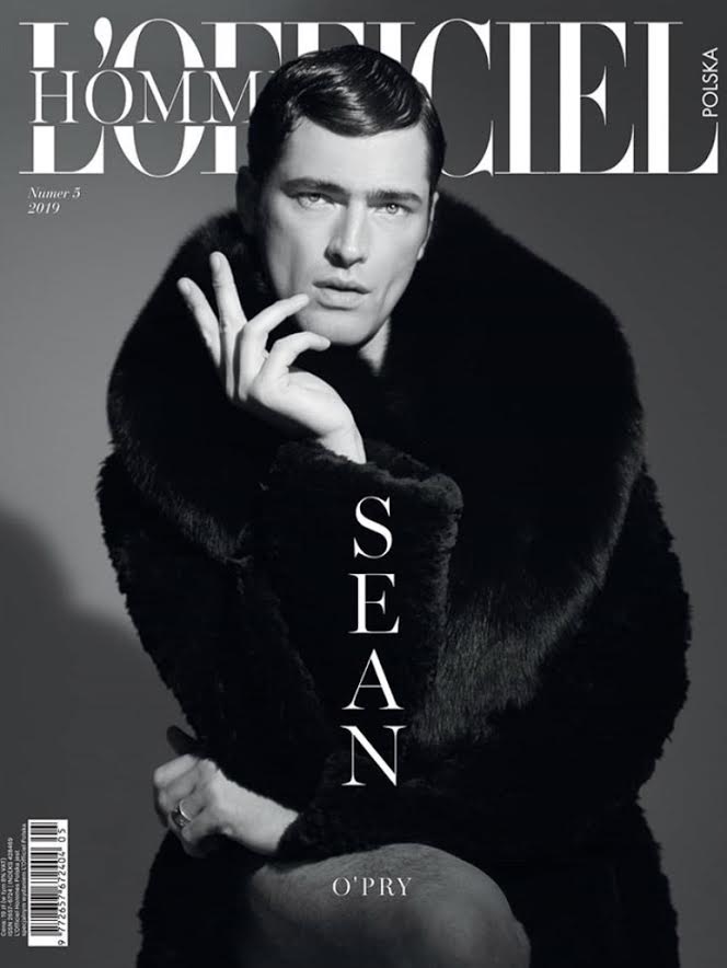 Male model Sean O’Pry wears Victoria Hayes fur coat on the cover of L’Officiel Poland April 2019