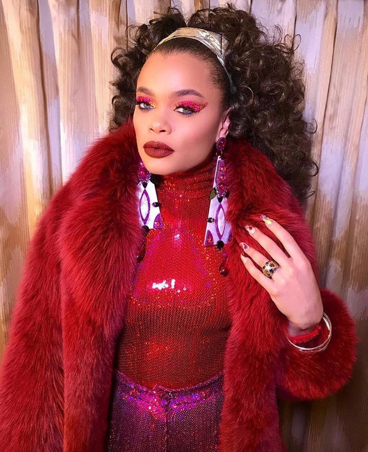 Andra Day wears the laser cut earrings for her NYE performance