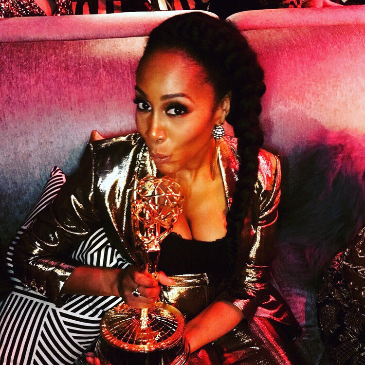 Simone Missick wears The Victoria Hayes Dina Metallic Suit